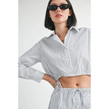 Emory Park blue and white cotton beach top with vertical stripes worn with matching bottoms