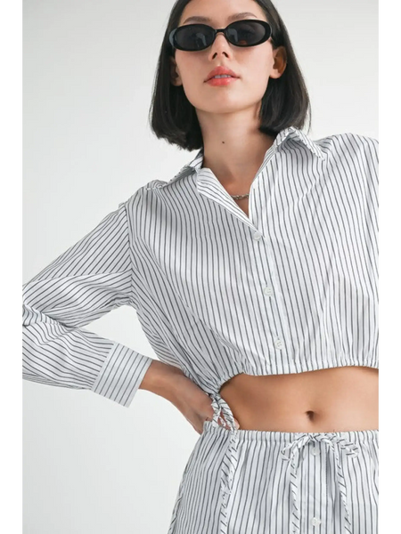 Emory Park blue and white cotton beach top with vertical stripes worn with matching bottoms