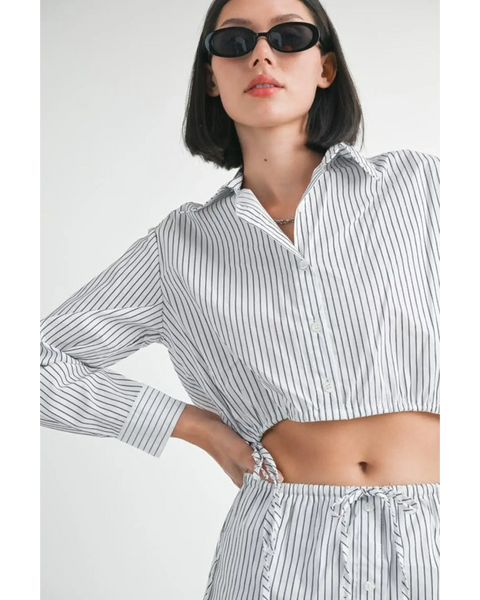Emory Park blue and white cotton beach top with vertical stripes worn with matching bottoms