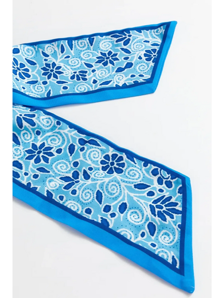 Close-up of blue floral pattern fabric detail for blue floral maxi dress affordable by Trendsi