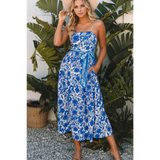 lady wearing a maxi dress affordable by Trendsi midi dress with spaghetti straps and waist tie