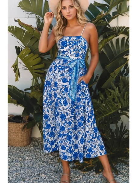 lady wearing a maxi dress affordable by Trendsi midi dress with spaghetti straps and waist tie