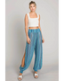 Babe Beachwear blue lightweight open leg beach pants with striped pattern worn with white tank top
