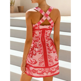 Trendsi pink patterned mini dress with crisscross straps and button details on back