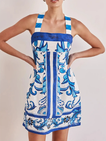 Trendsi blue mini dress with white and blue floral pattern and wide shoulder straps