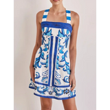Trendsi blue mini dress with white background and intricate floral patterns perfect for summer