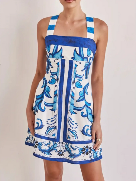 Trendsi blue mini dress with white background and intricate floral patterns perfect for summer