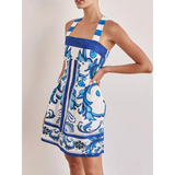 Trendsi blue mini dress with white and blue floral patterns and wide straps