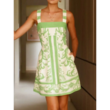 Trendsi green and white patterned mini dress with square neckline and sleeveless design