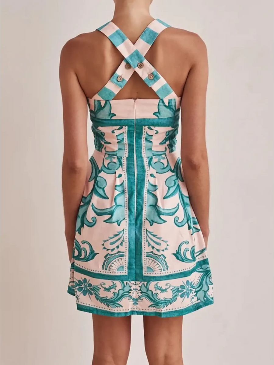 Trendsi blue mini dress with crisscross straps and intricate floral patterns on back