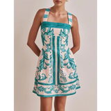 Trendsi blue mini dress with intricate floral and abstract patterns and wide straps
