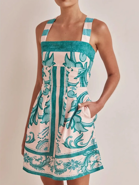 Trendsi blue mini dress with floral pattern, square neckline, and pockets on model