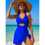Beach Babes sexy cutout swim dress in blue with halter neck and side slit worn at the beach
