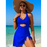 Beach Babes sexy cutout swim dress in blue with halter neck and side tie by the ocean