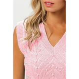 Blush pink sleeveless blouse by Trendsi featuring a V-neck and decorative pearl accents