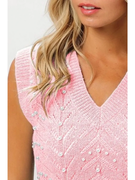 Blush pink sleeveless blouse by Trendsi featuring a V-neck and decorative pearl accents