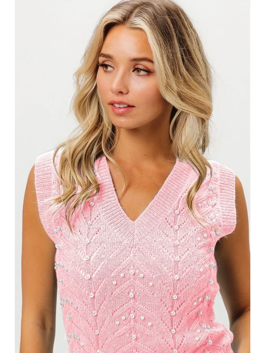 Trendsi blush pink sleeveless blouse with V-neck and pearl embellishments on knitted fabric