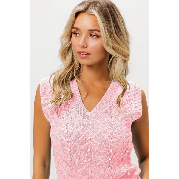 Trendsi blush pink sleeveless blouse with V-neck and pearl embellishments on knitted fabric