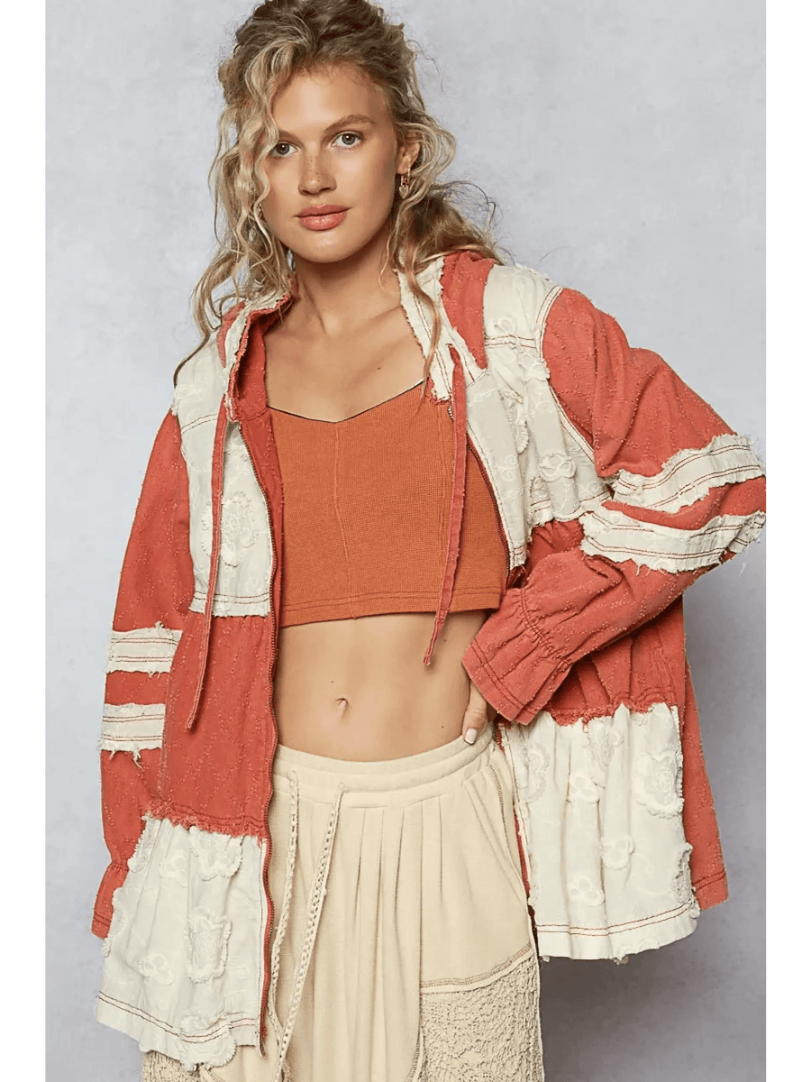 Trendsi boho chic beachwear jacket in rust and cream colors worn over a crop top and skirt