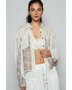 Trendsi long sleeve shirt styled as boho chic beachwear top with floral and plaid patchwork design