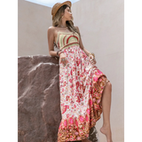 Trendsi crochet boho maxi dress with floral patterns and slit worn with a straw hat