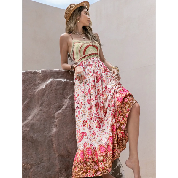 Trendsi crochet boho maxi dress with floral patterns and slit worn with a straw hat