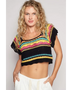 POL boho knit beach top in black multicolor worn by model with white pants
