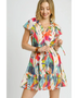 Trendsi orange boho mini dress with colorful leaf print and flutter sleeves on smiling model