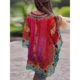 Babe Beachwear vibrant boho mini swimsuit coverup with colorful floral and animal print design