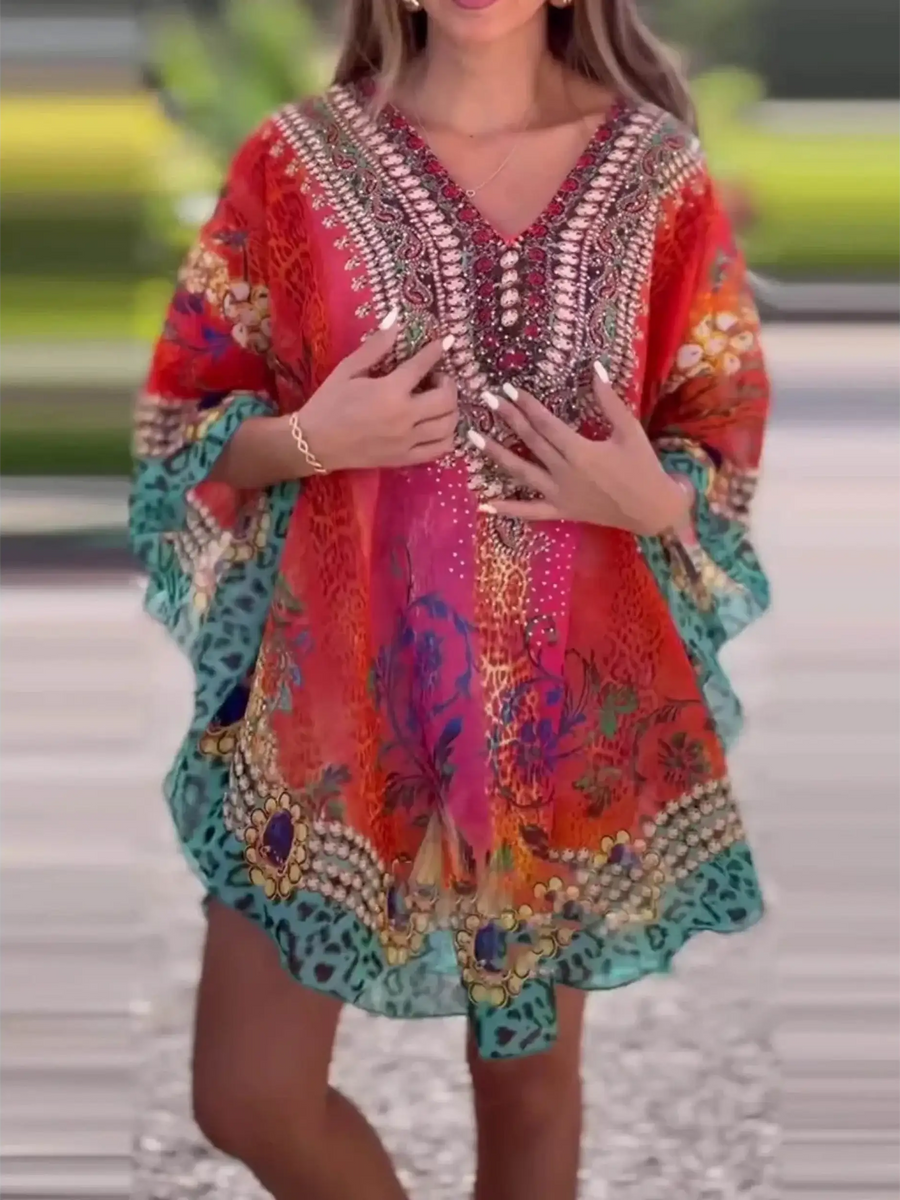 Babe Beachwaer boho mini swimsuit coverup with colorful floral and tribal patterns in red and turquoise