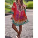 Babe Beachwear vibrant boho mini swimsuit coverup with colorful floral and geometric patterns