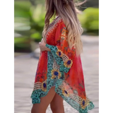 Babe Beachwear boho mini swimsuit coverup in vibrant red and teal with floral patterns