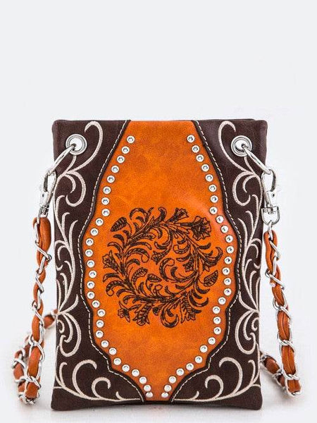 Babe Beachwear boho summer crossbody purse with brown and orange floral design and studded details