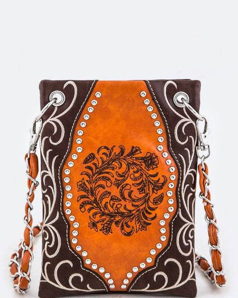 Babe Beachwear boho summer crossbody purse with brown and orange floral design and studded details