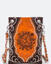 Babe Beachwear boho summer crossbody purse with brown and orange floral design and studded details