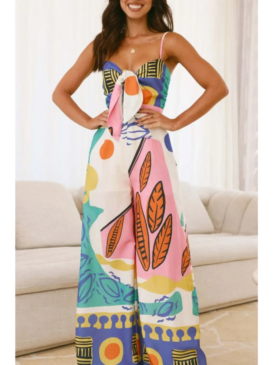 Trendsi boho summer jumpsuit for women with colorful abstract print and spaghetti straps