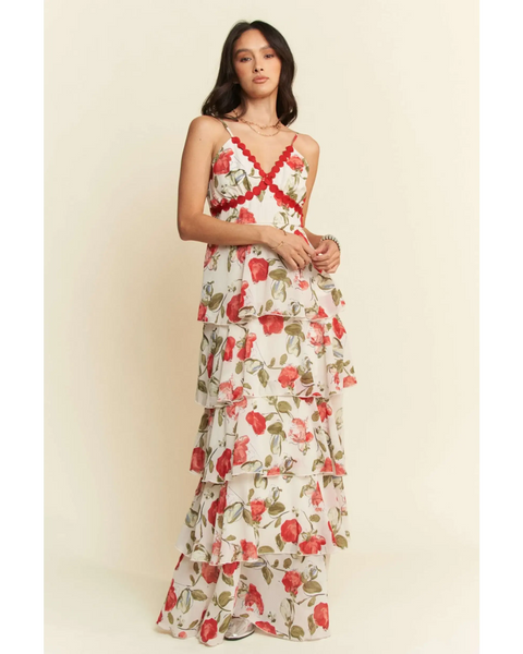 Trendsi boho tiered maxi dress with floral print and red trim on a model