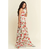 Trendsi boho tiered maxi dress with red floral print and spaghetti straps on model
