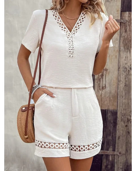 Babe Beachwear 2 piece top and shorts set in white with eyelet trim and short sleeves