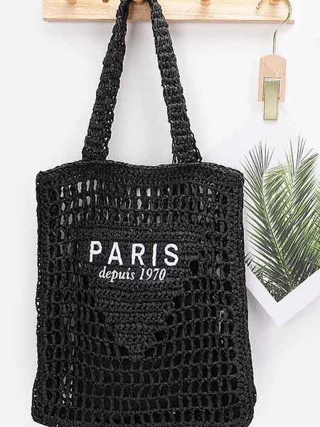 Black Paris Crochet Straw Summer Tote bag by Babe Beachwaer with open weave design and Paris logo
