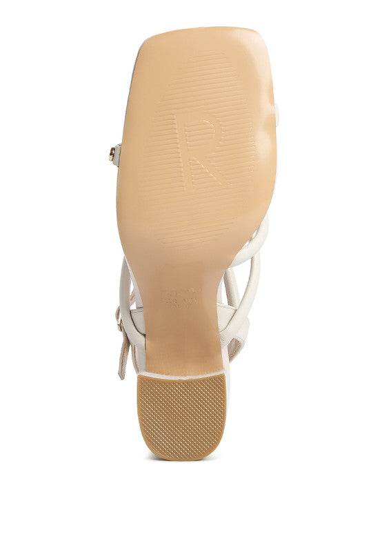 Bottom view of Babe Beachwear nude block heel summer sandals showing sole and heel texture