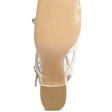 Bottom view of Babe Beachwear nude block heel summer sandals showing sole and heel texture