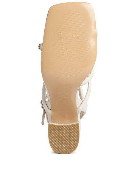 Bottom view of Babe Beachwear nude block heel summer sandals showing sole and heel texture