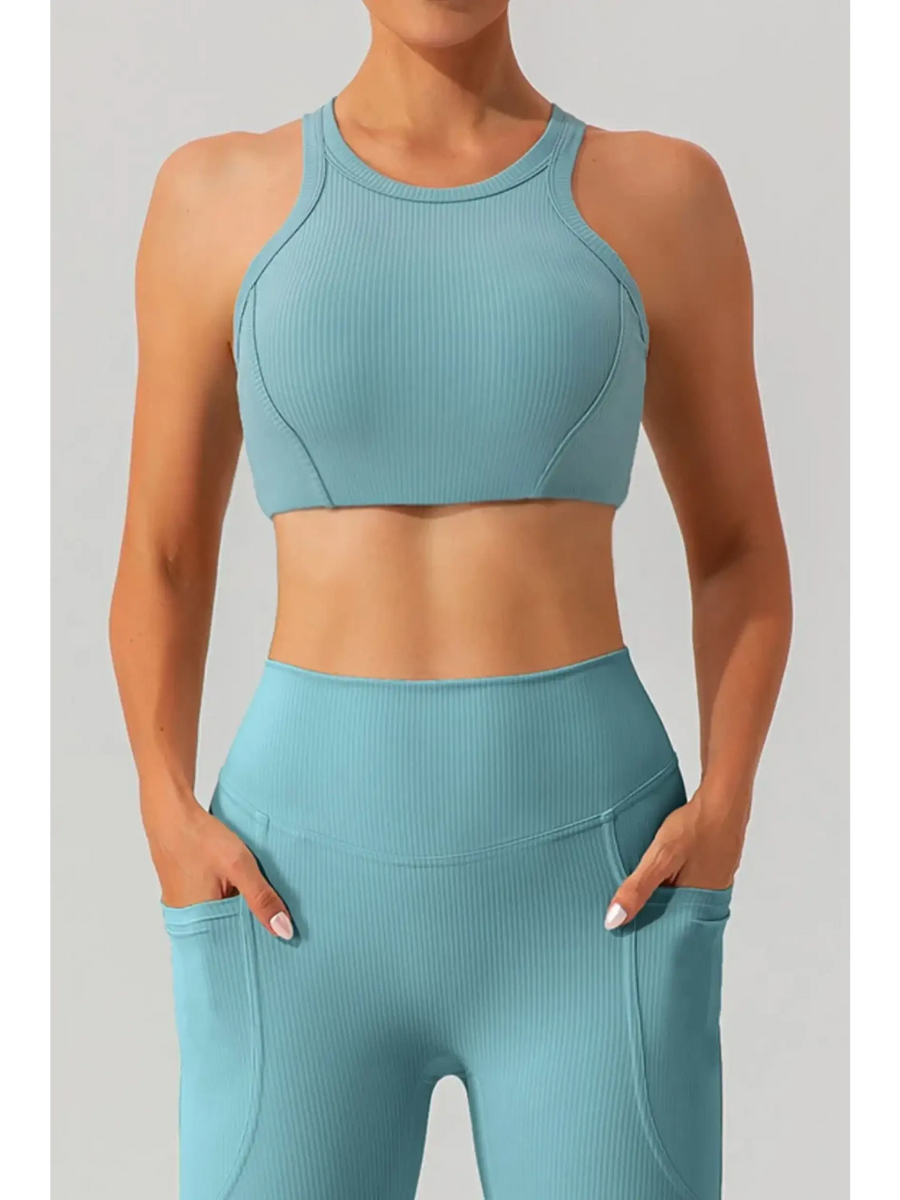 Babe Beachwear women's racerback active tank in light blue ribbed fabric styled with matching high-waist leggings