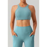 Babe Beachwear women's racerback active tank in light blue ribbed fabric styled with matching high-waist leggings