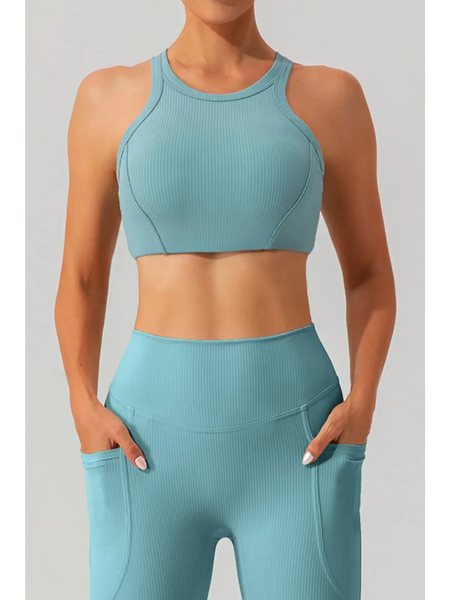 Babe Beachwear women's racerback active tank in light blue ribbed fabric styled with matching high-waist leggings