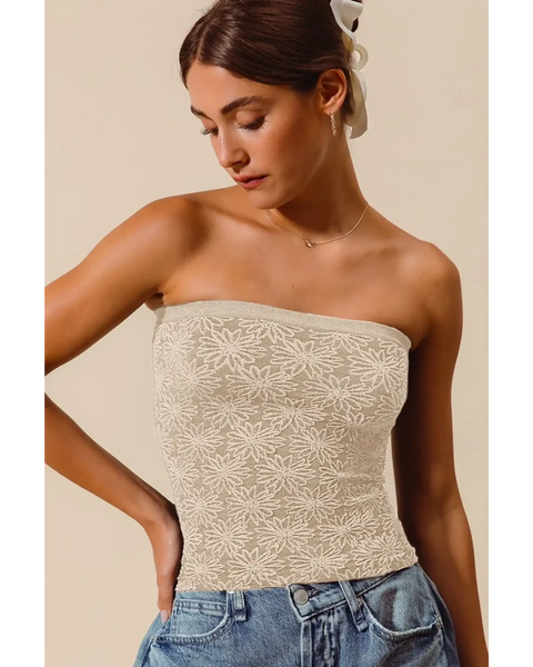 Babe Beachwear women's two tone tube top with floral lace design worn with denim jeans