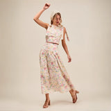 Trendsi floral skirt set worn by woman styled as breathable vacation outfit for women