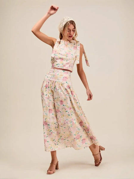Trendsi floral skirt set worn by woman styled as breathable vacation outfit for women