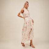 Trendsi breathable vacation outfit for women featuring a floral sleeveless skirt set with tie shoulder details